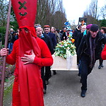 Your friends take turns carrying your casket for more than a kilometer in the biting bitter cold, chanting and singing songs.